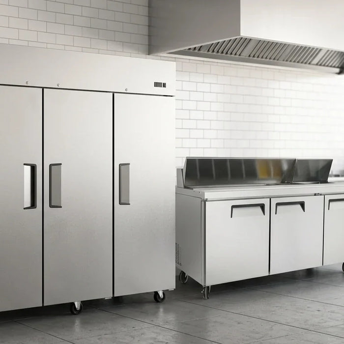 A high-resolution, professional commercial kitchen scene featuring stainless steel Atosa refrigeration and prep equipment