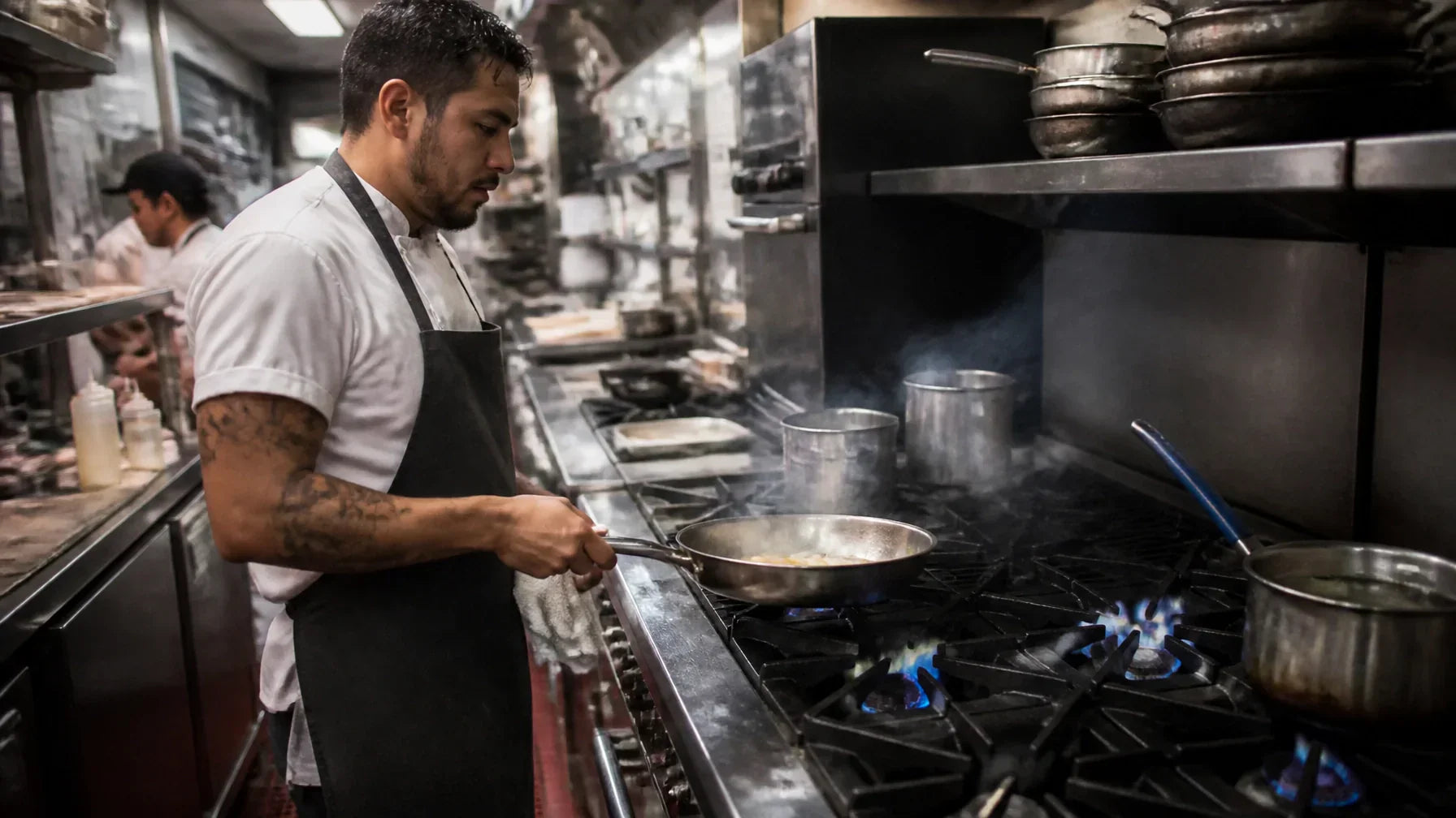 Commercial Atosa AGR 6-burner gas range with cast-iron grates and stainless steel back guard on a restaurant cookline