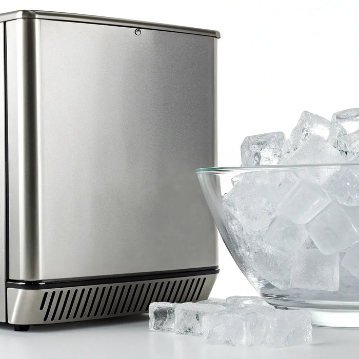 A commercial ice maker for sale with a bowl of freshly made ice cubes.