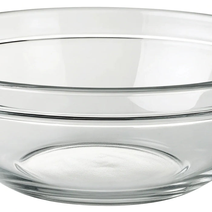 Clear glass Anchor Hocking mixing bowl, durable and versatile.