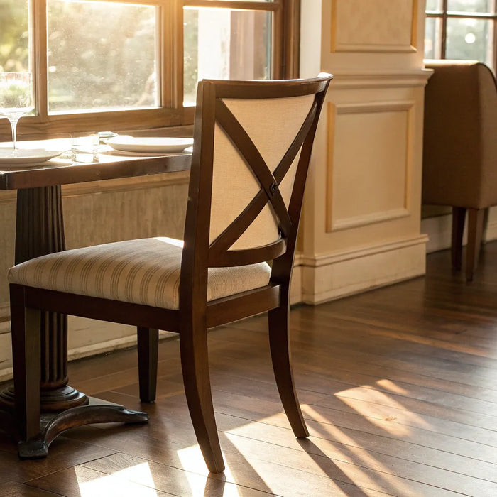 Sturdy cross back dining chair in a restaurant setting.