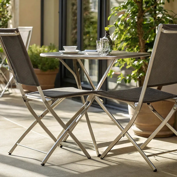 Metal folding chairs around a table.