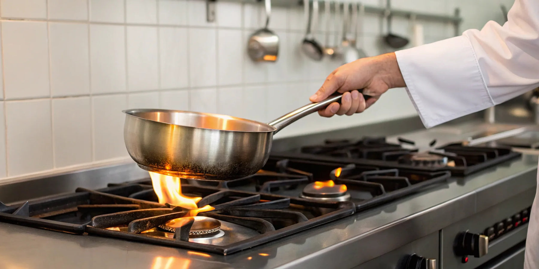 Stainless steel saucepan on gas stovetop.