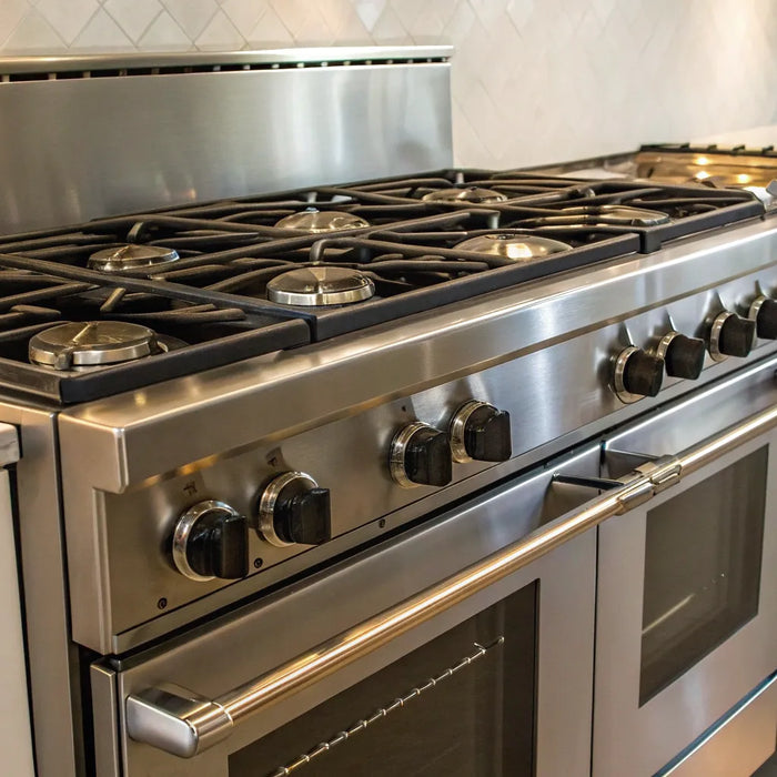 A commercial gas range providing reliable, high-power cooking for a business kitchen.
