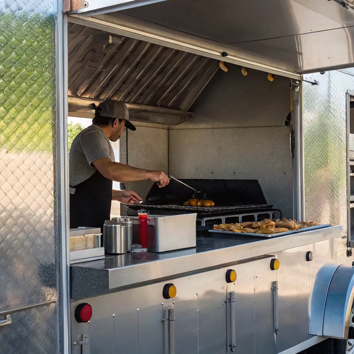 Essential food truck equipment in a mobile kitchen.
