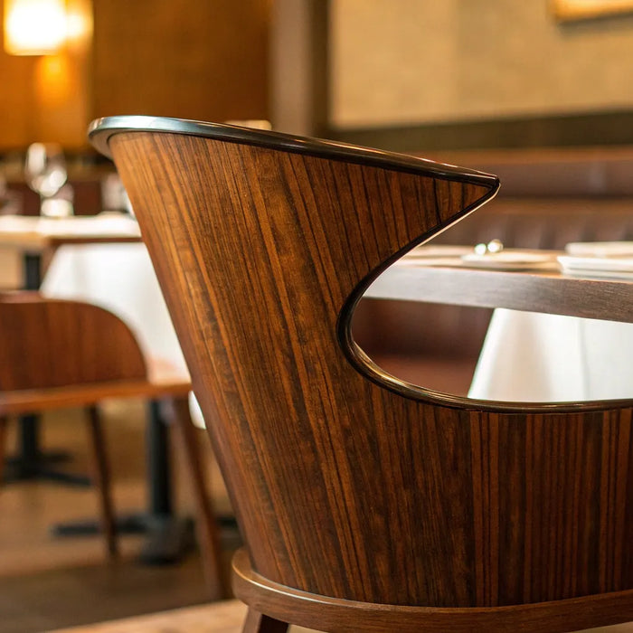 Stylish wooden restaurant chairs.