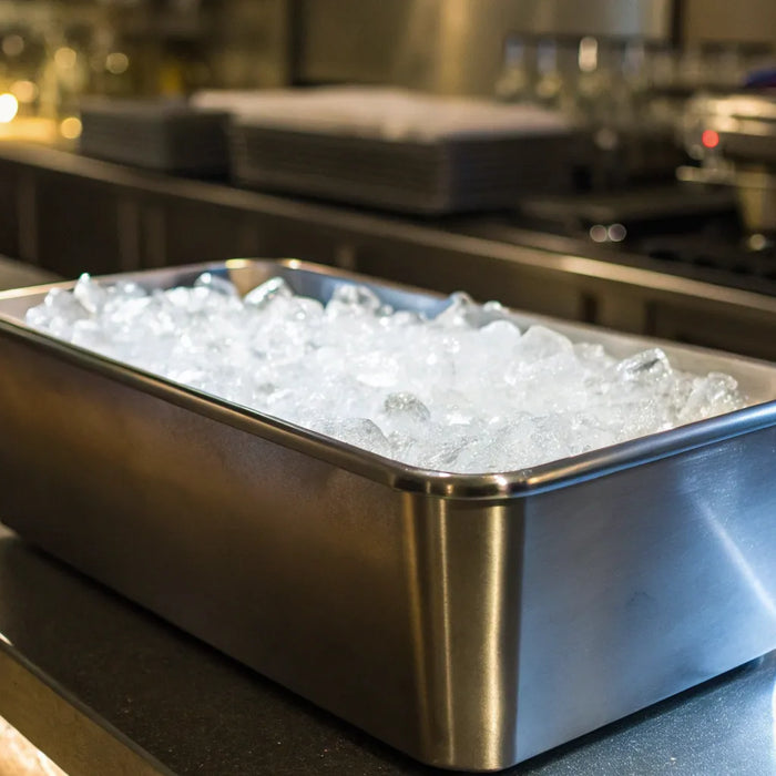 Restaurant ice bin filled with ice.