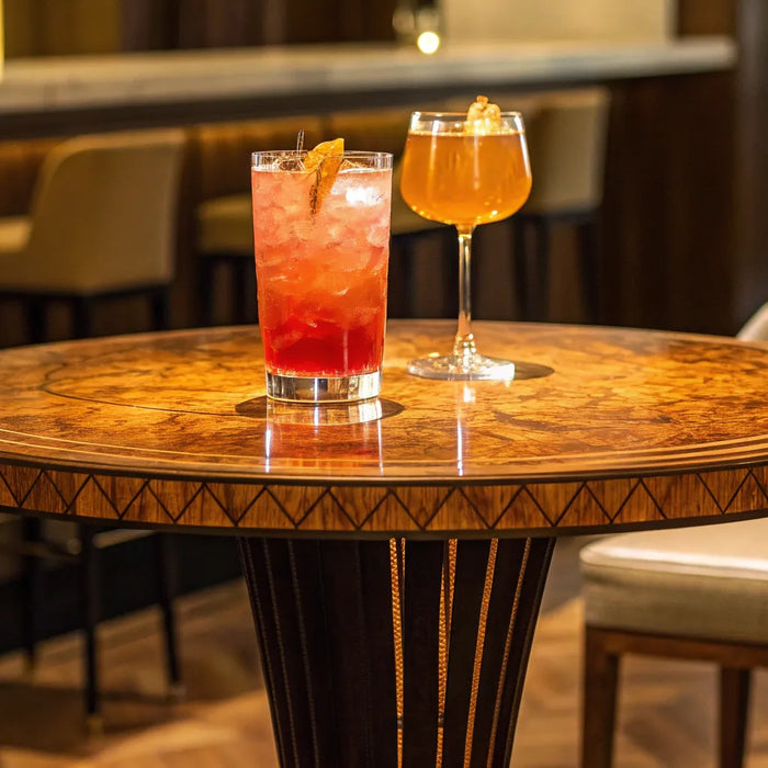 Tall bar table with wood finish.