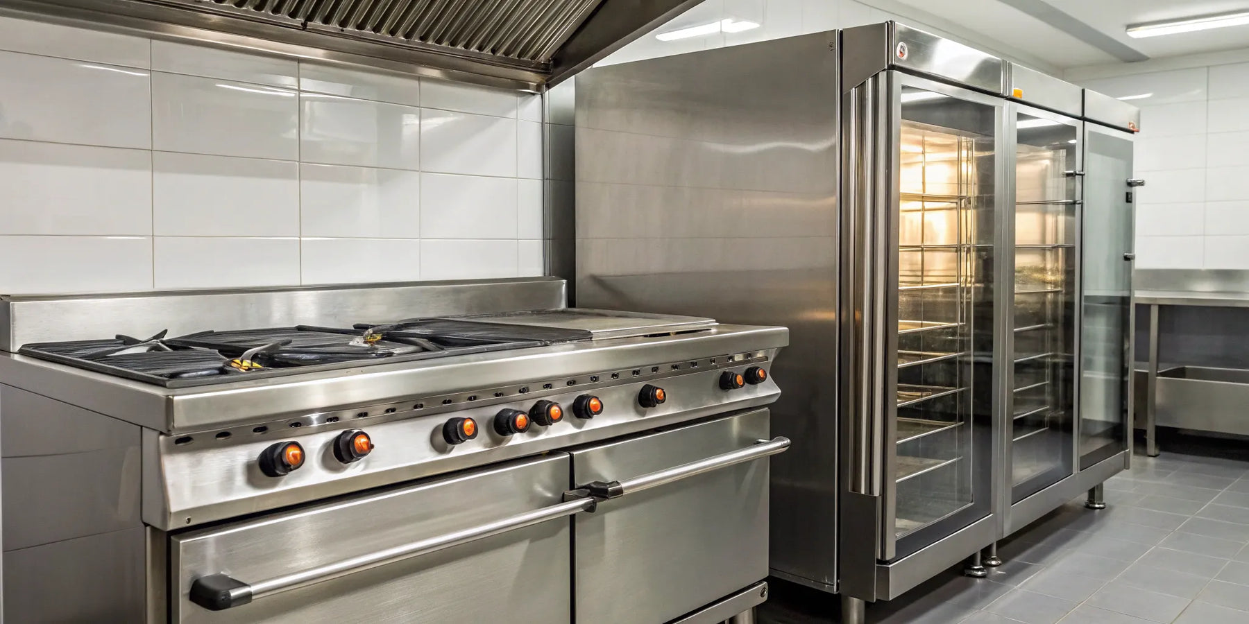 Portland restaurant equipment with a commercial range and refrigerator in a professional kitchen.