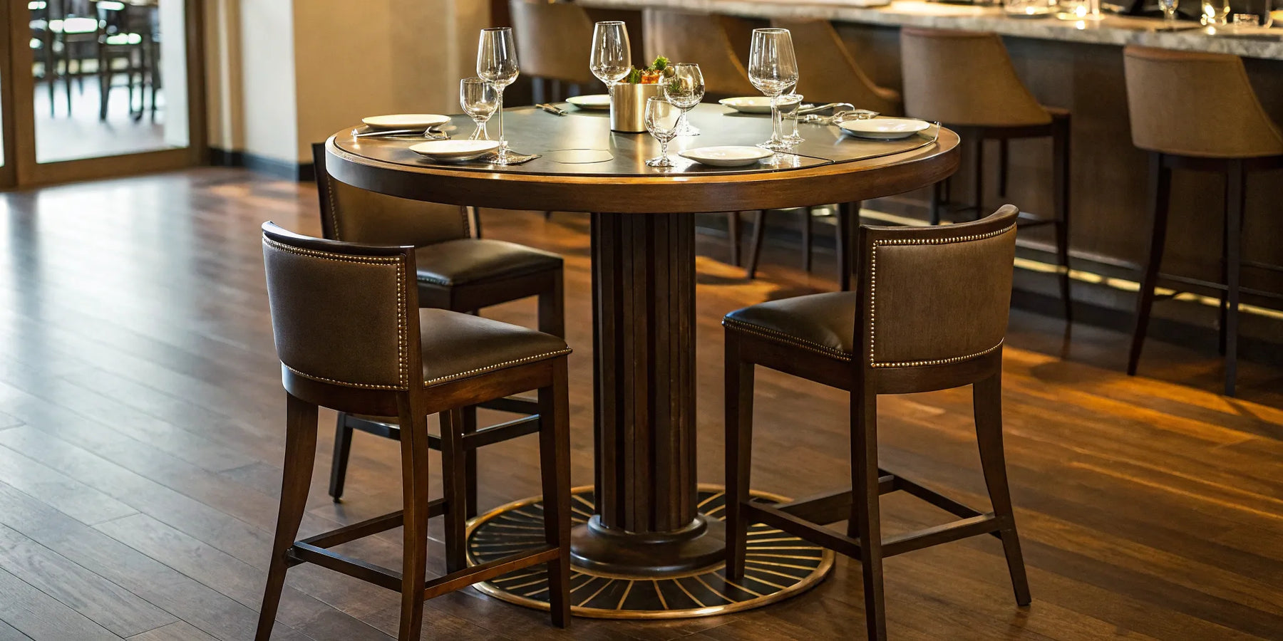 48-inch round bar height table in a restaurant setting.