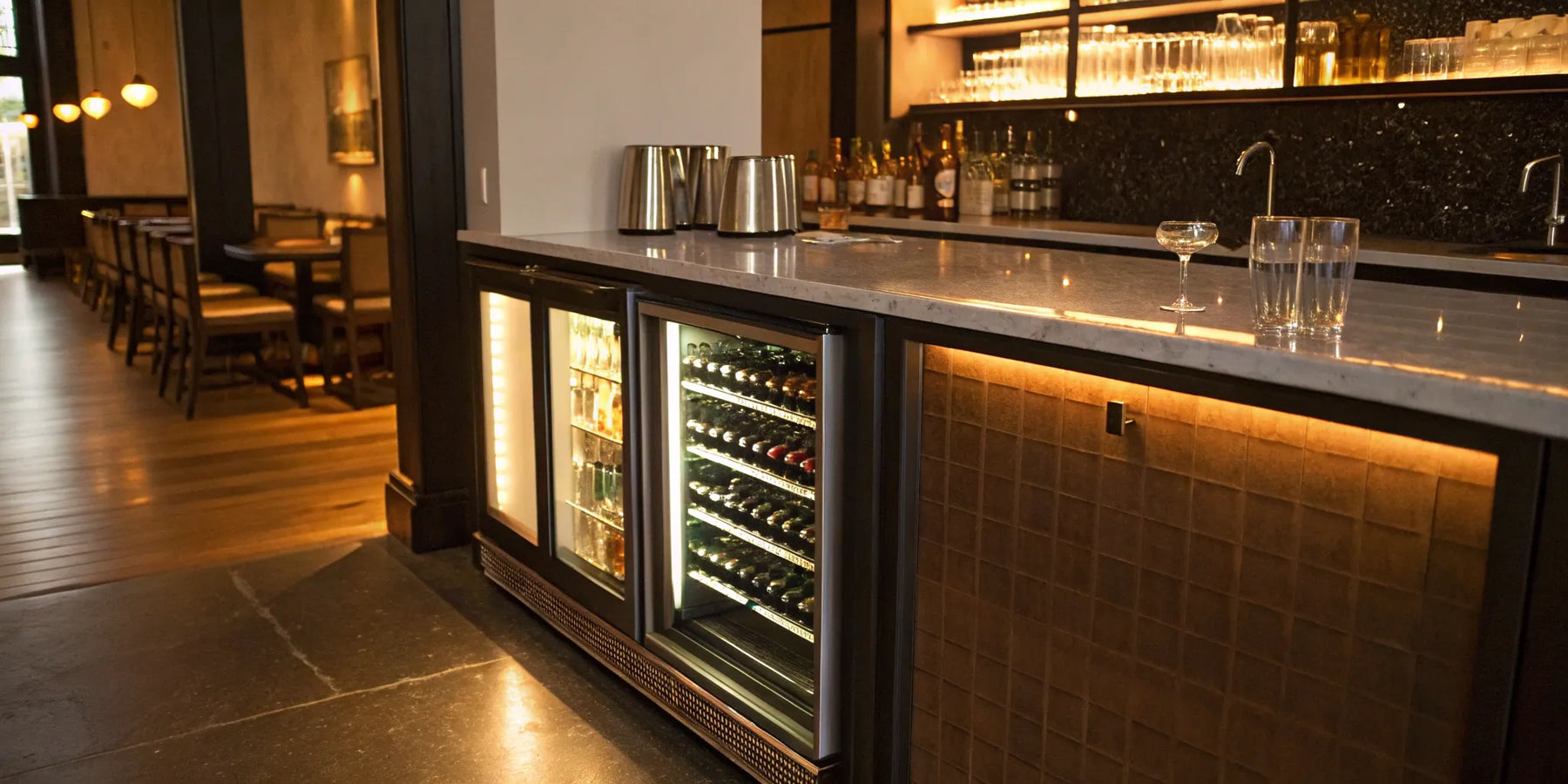 Undercounter bar refrigerator with glass door.