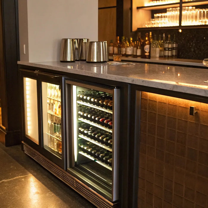 Undercounter bar refrigerator with glass door.