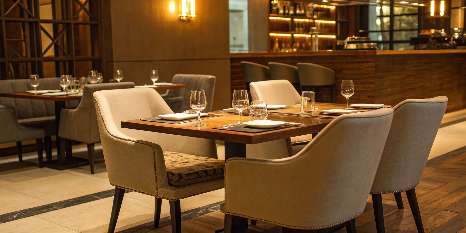 Restaurant furniture supplies: Tables, chairs, and bar seating.