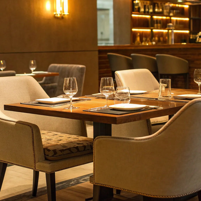 Restaurant furniture supplies: Tables, chairs, and bar seating.