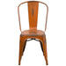 Distressed Orange Metal Chair